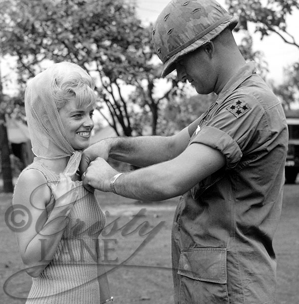 Cristy Lane receiving a medal from Sergeant in Vietnam.